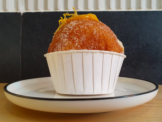 Mr. Holmes Bakehouse Bubbly Passion Fruit Donut