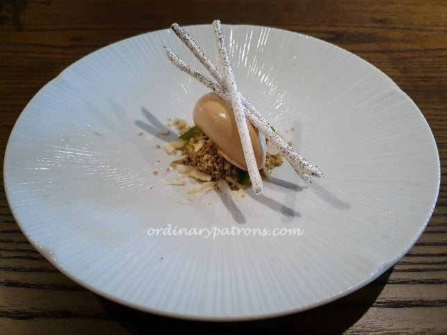 Pu-erh tea ice cream, brie cheese, kumquat, hazelnut 