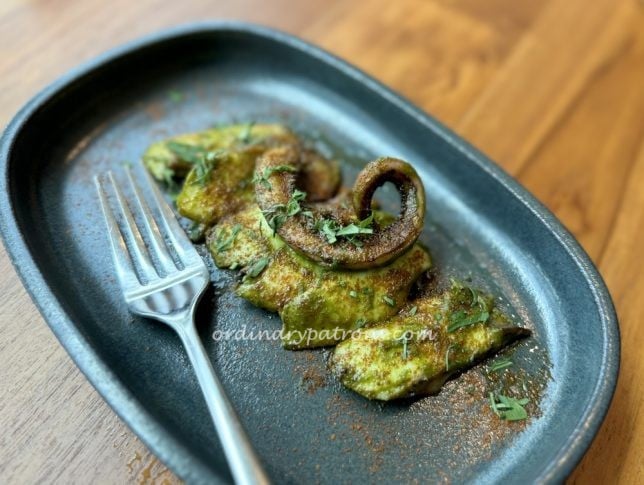 squid tentacle was coated with a pesto sauce 