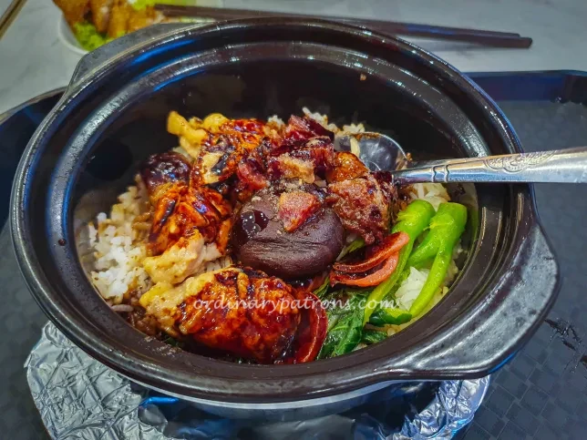 Chicken and Sausage Claypot Rice  at Congee Concept