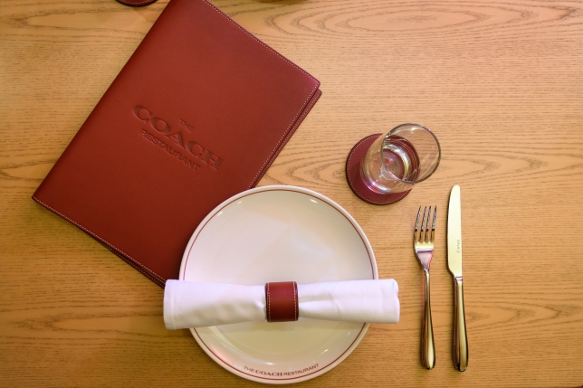 Coach's heritage in leather goods.