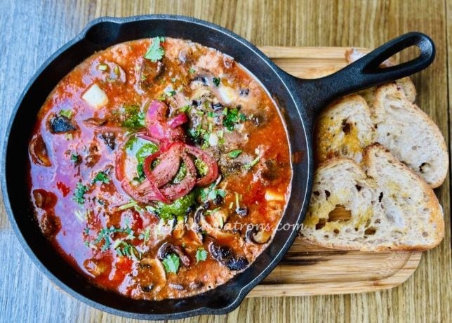Bread Yard Cafe Grilled Chipotle Chicken bowl ($14) and a vegetarian Mushroom Shakshuka ($16).