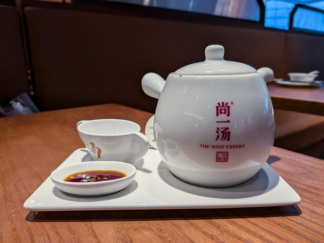 The Chinese Date and Fig Root Chicken Soup arrived in a white porcelain pot. 